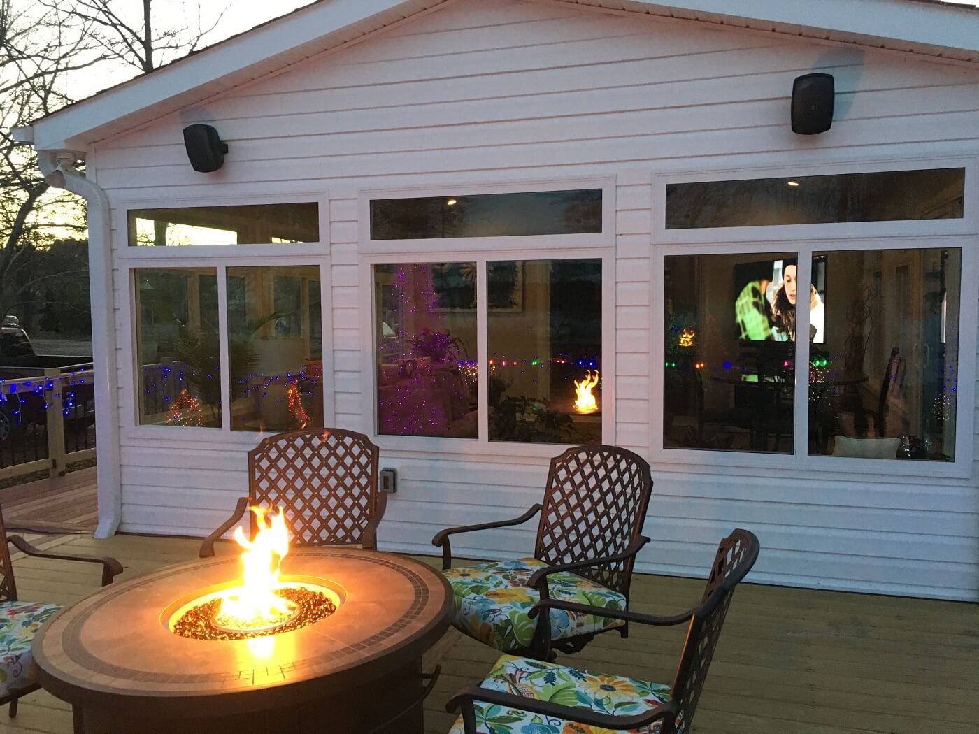 Sunroom and deck with fire pit