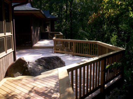 This spacious pressure treated deck in Columbia, SC overlooks the tranquil Saluda river.