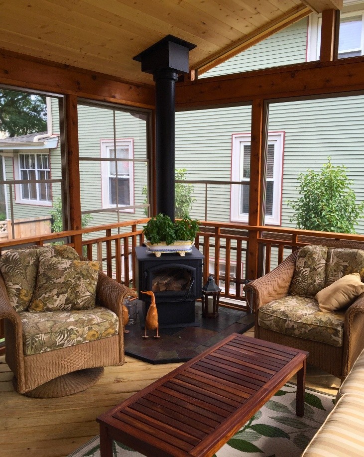 Fort Mill, SC This 3 Season Room features Eze-Breeze 4-track windows and a gorgeous fireplace to warm up the space in the cooler months.