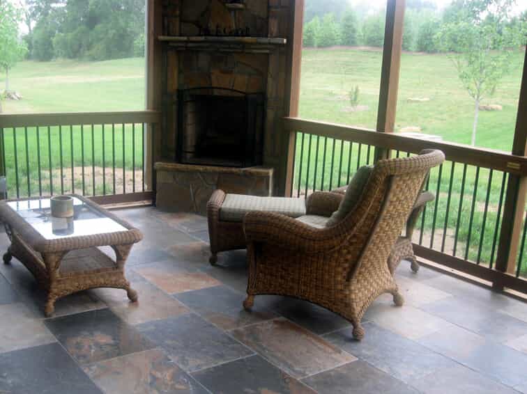 Screened in porch with built in fireplace