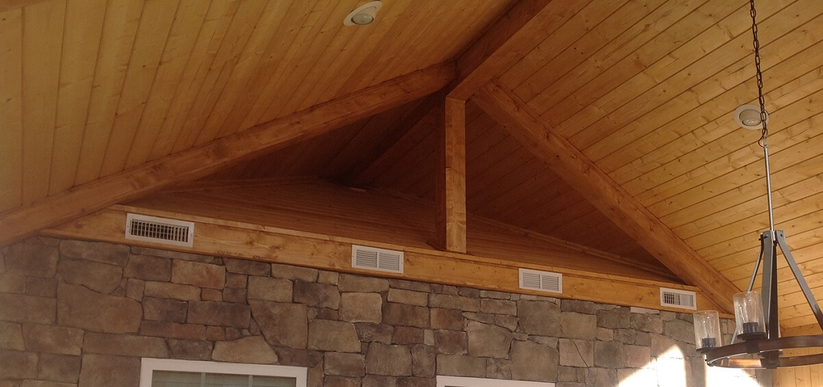 exposed wooden ceiling on a porch