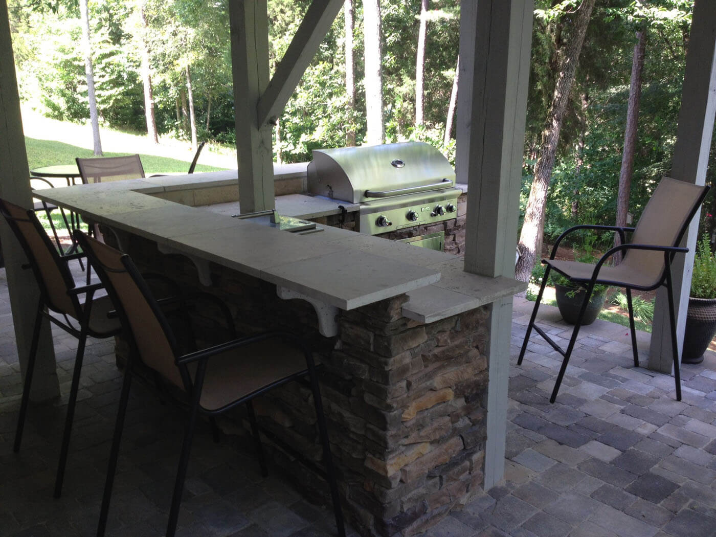 paver patio with outdoor kitchen