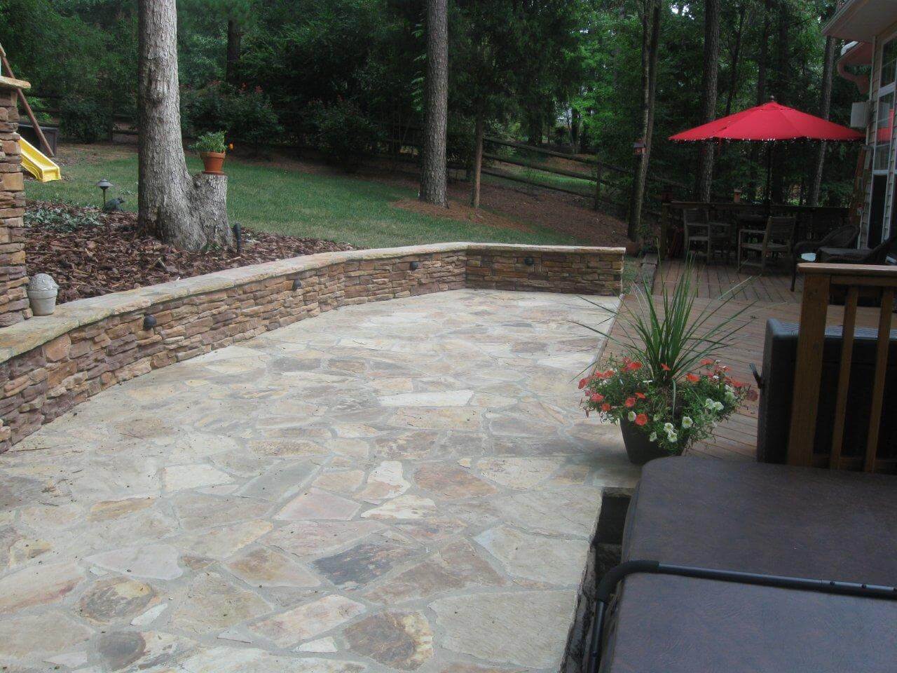 patio with stone wall
