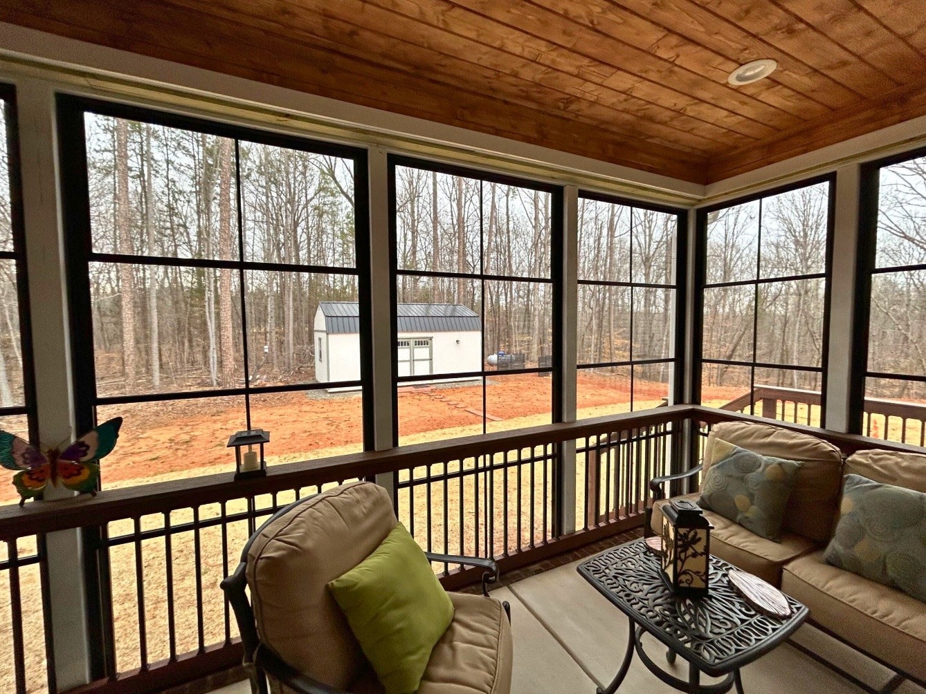 Outdoor living space with screened in porch