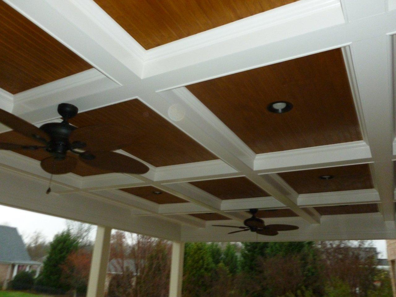 porch with a flat paneled ceiling with ceiling fans
