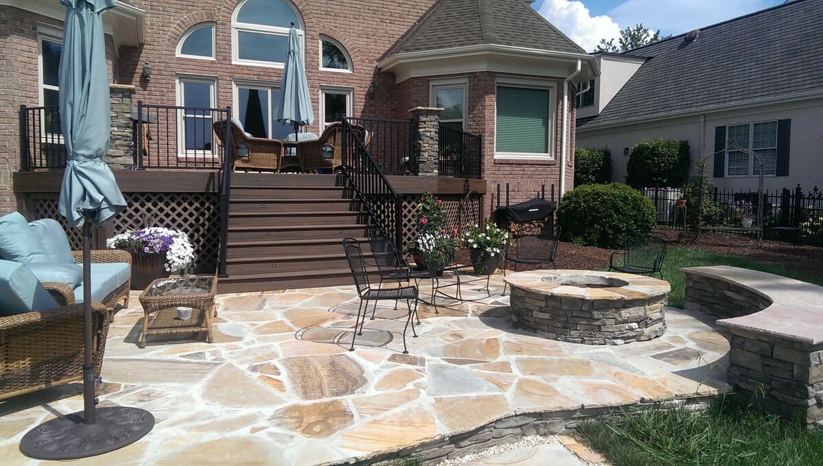 Charlotte Flagstone Patio With Fire Pit And Bench Retaining Wall 1)