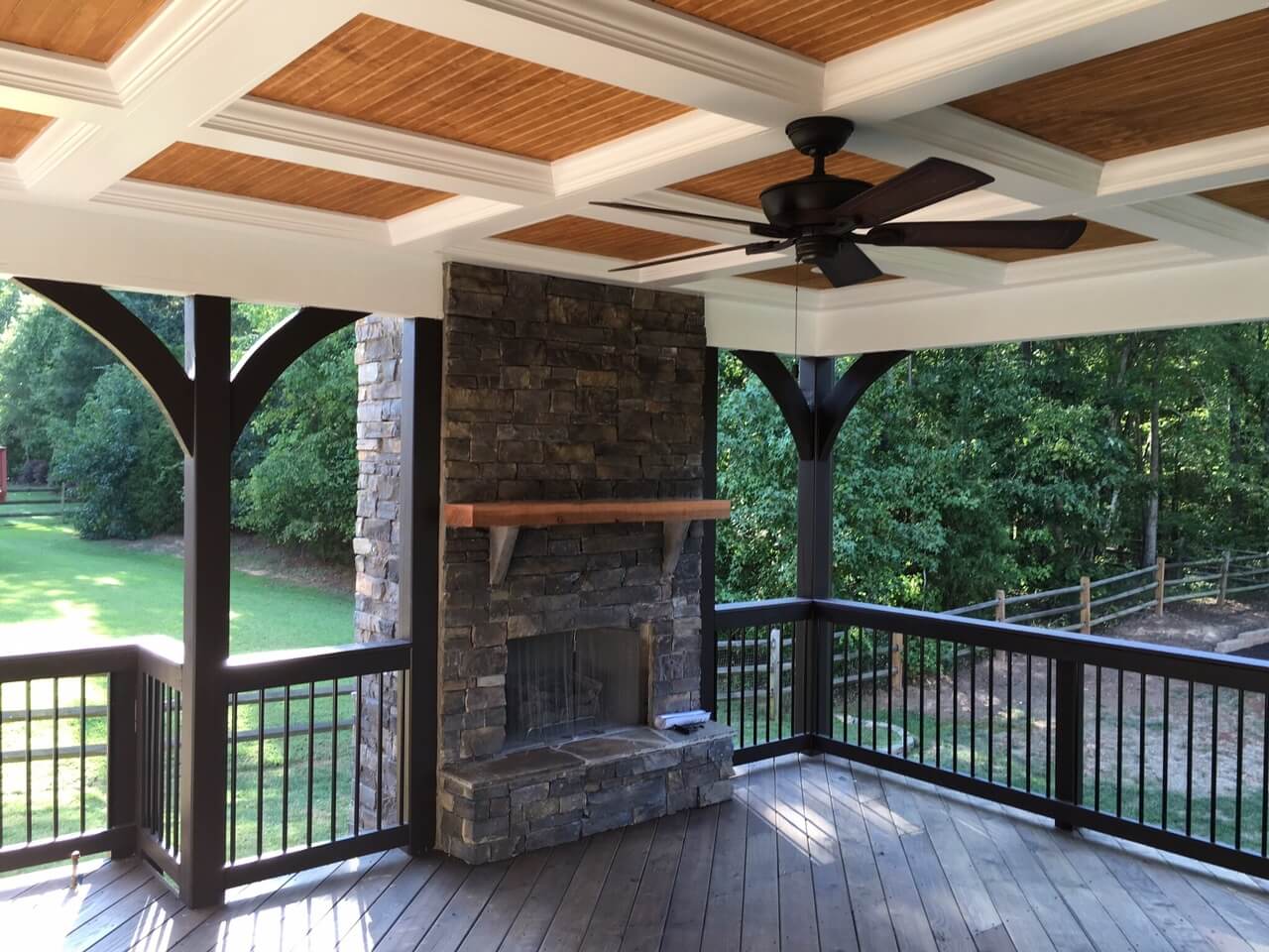Covered porch with outdoor fireplace