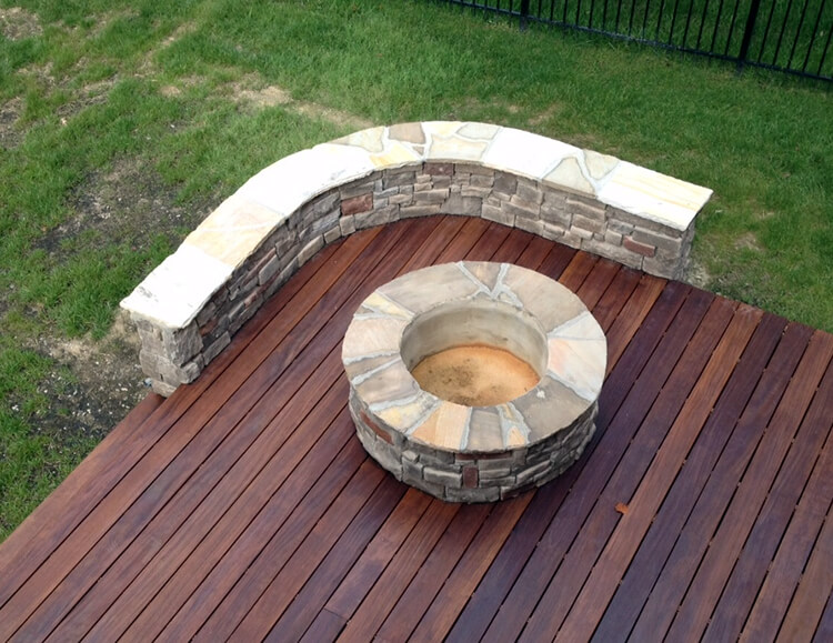 Adding Stone to Your Outdoor Living Charlotte IPE Deck With Fire Pit