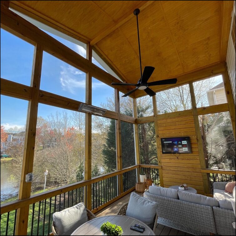 screened in porch with tall ceilings