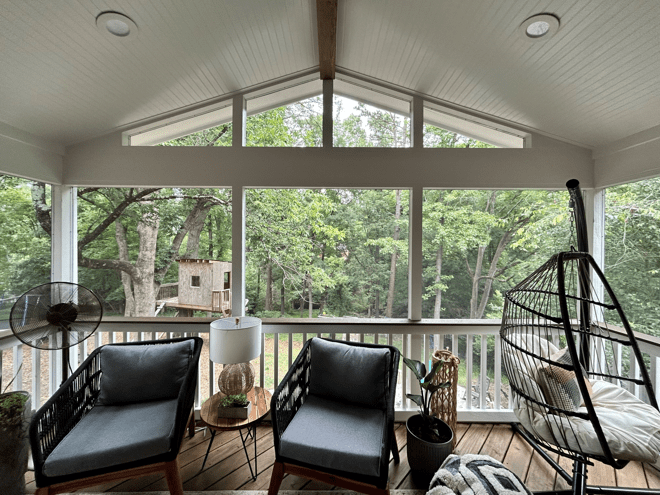 screened porch with seating