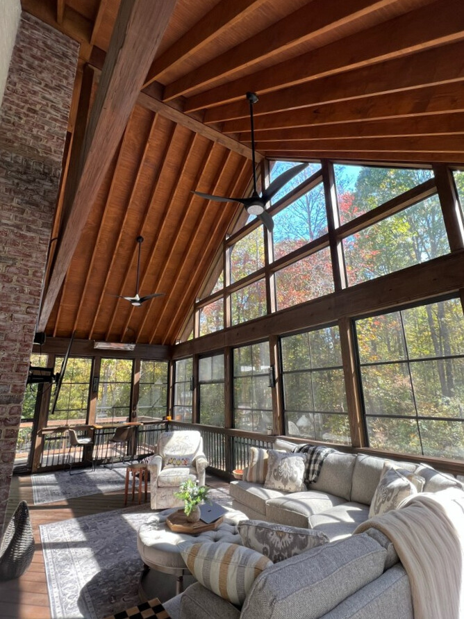 Eze-Breeze three-season room with vaulted wood ceiling and large windows built by Archadeck in Waxhaw, NC.