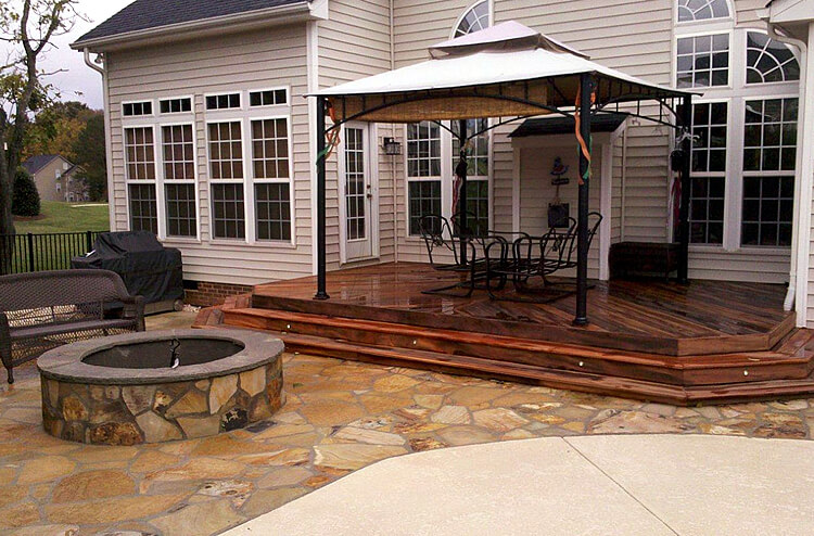 flagstone patio and Ipe deck with firepit