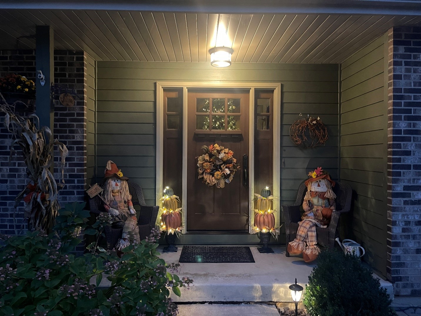 front porch decorated for fall