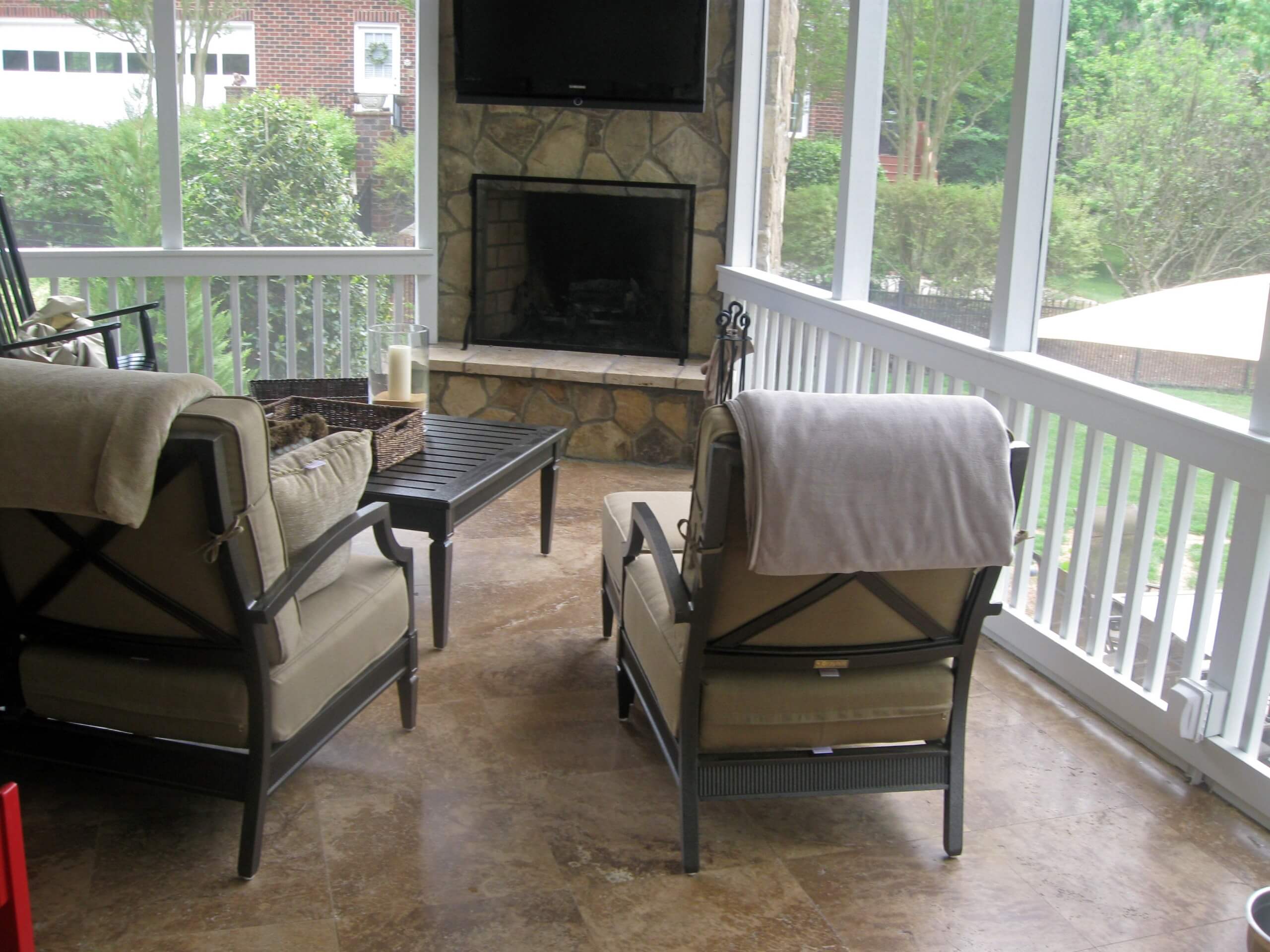 screened porch with travertine tile