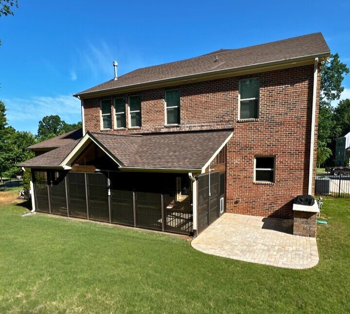 Screened porch and paver patio combination designed and built by Archadeck for a Waxhaw, NC home.