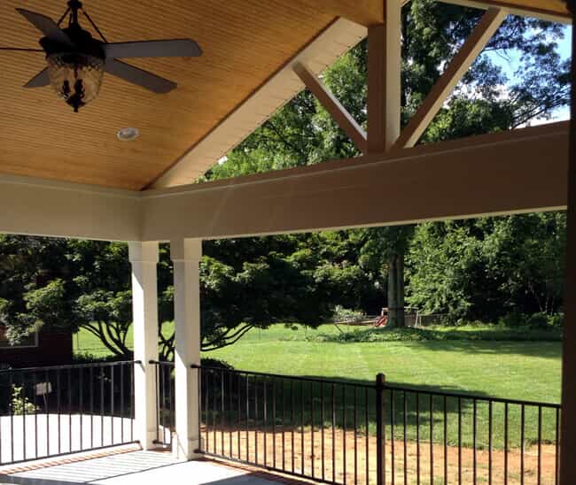 covered but open porch with high ceiling