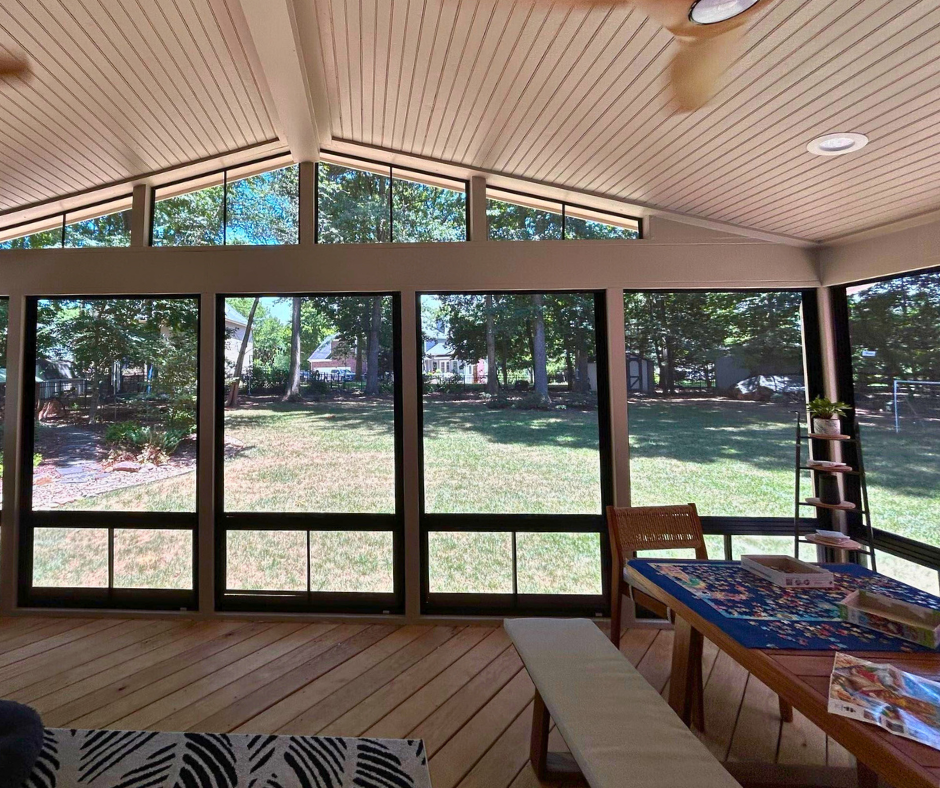 Waxhaw, NC Three Season Room with Eze-Breeze Windows. As you can see the windows are pushed all the way down exposing the screens allowing fresh air to flow through.