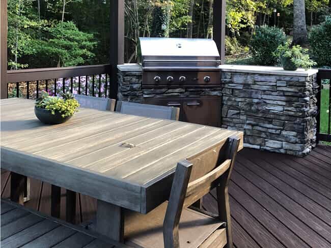 deck with built in barbecue and table