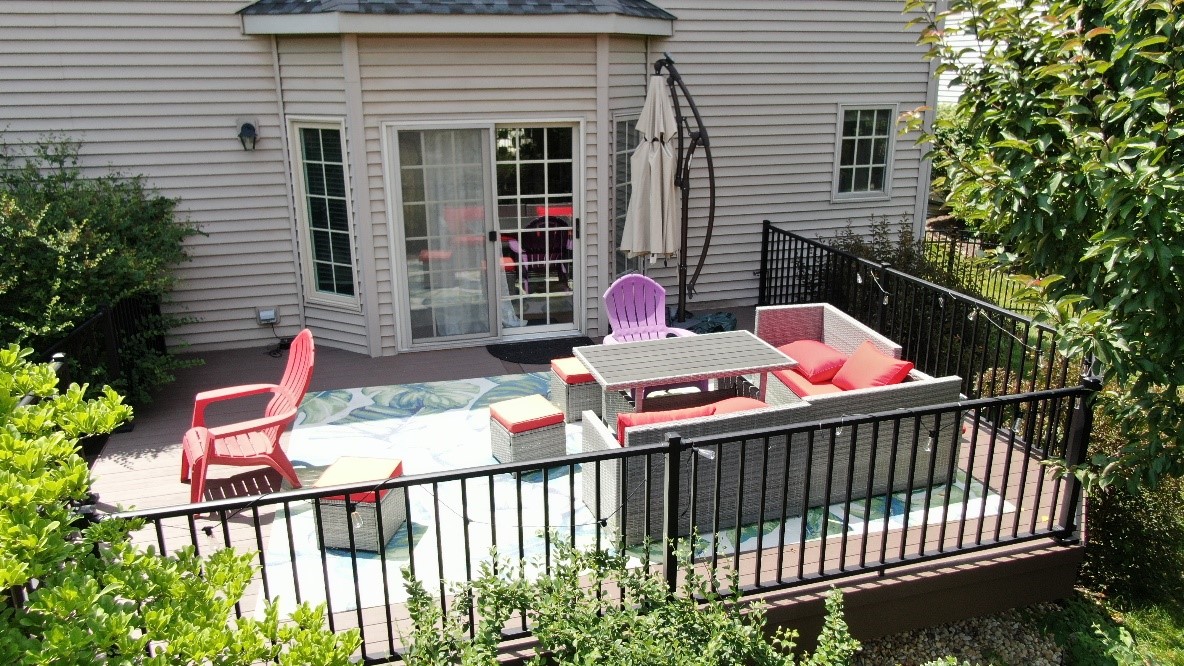 custom deck with patio furniture