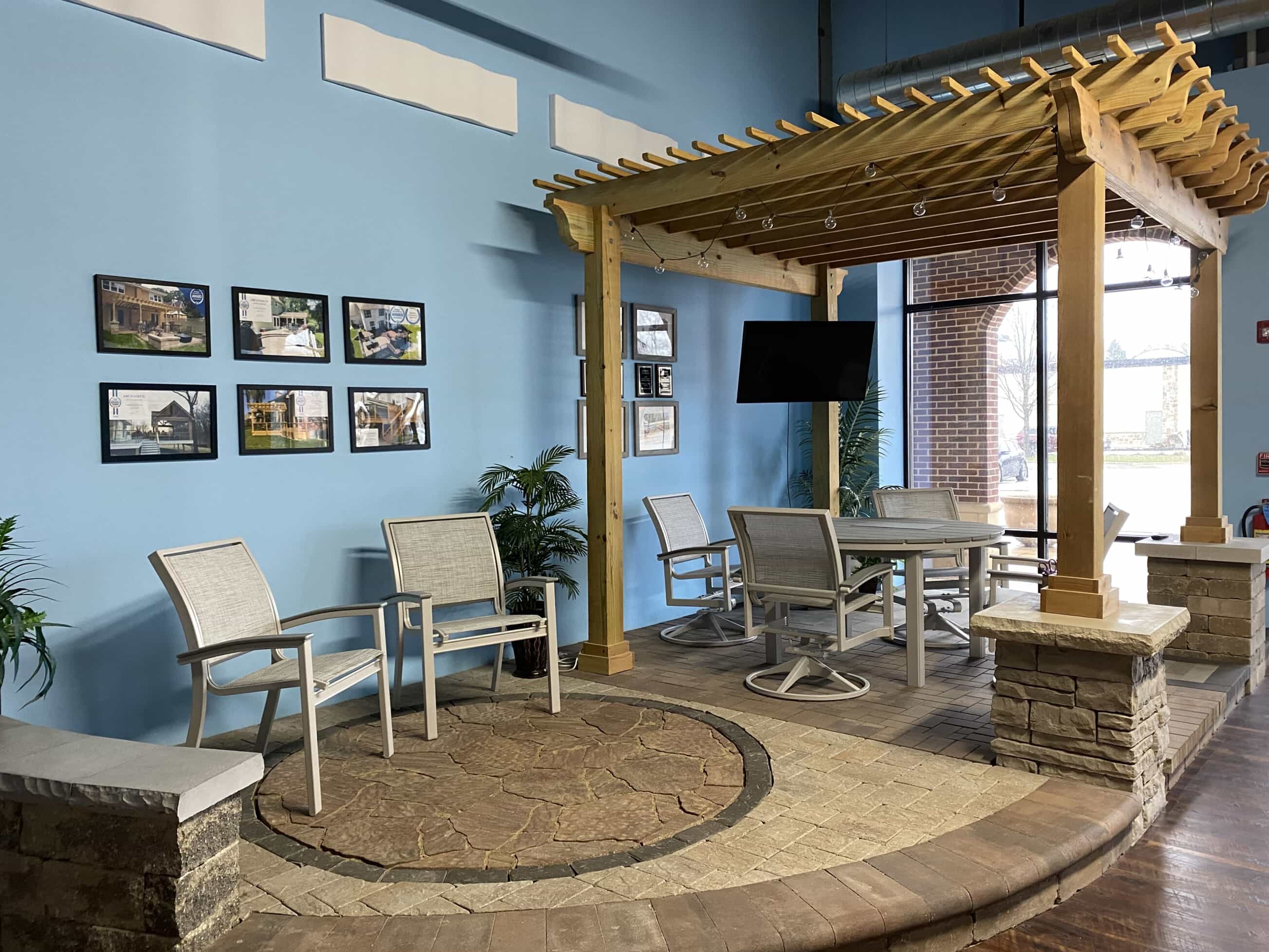 Archadeck of Chicagoland Design Center showroom with pergola and outdoor furniture displays in Naperville, IL