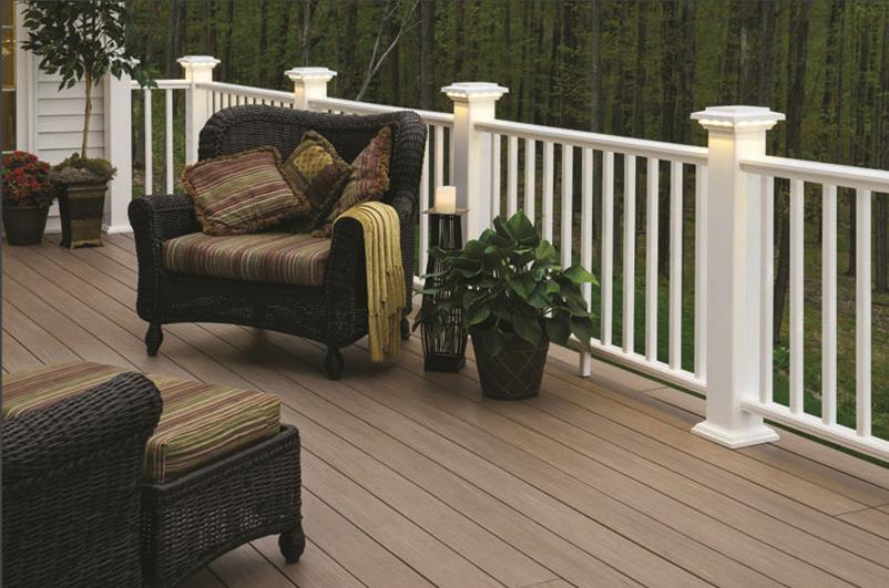 Azek Arbor Silver Oak material deck with chair and plants