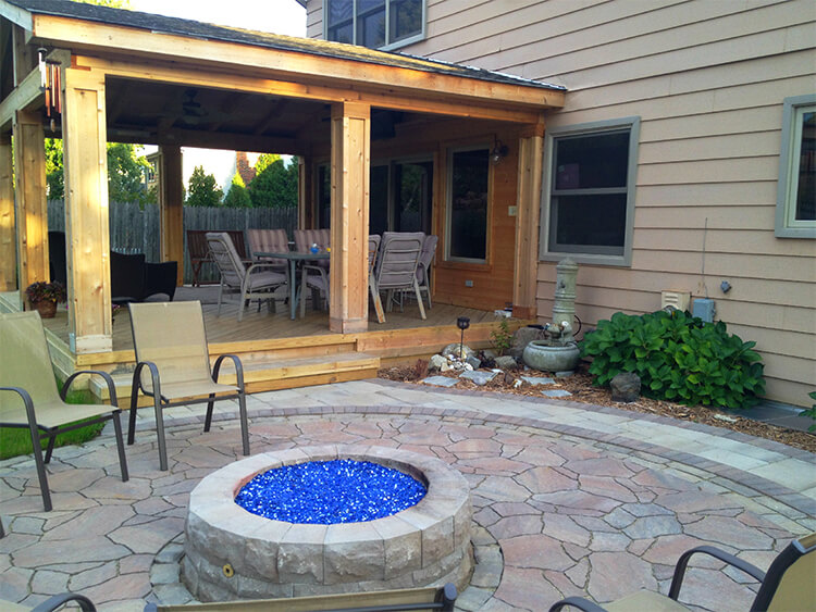 Custom open porch with patio and fire pit