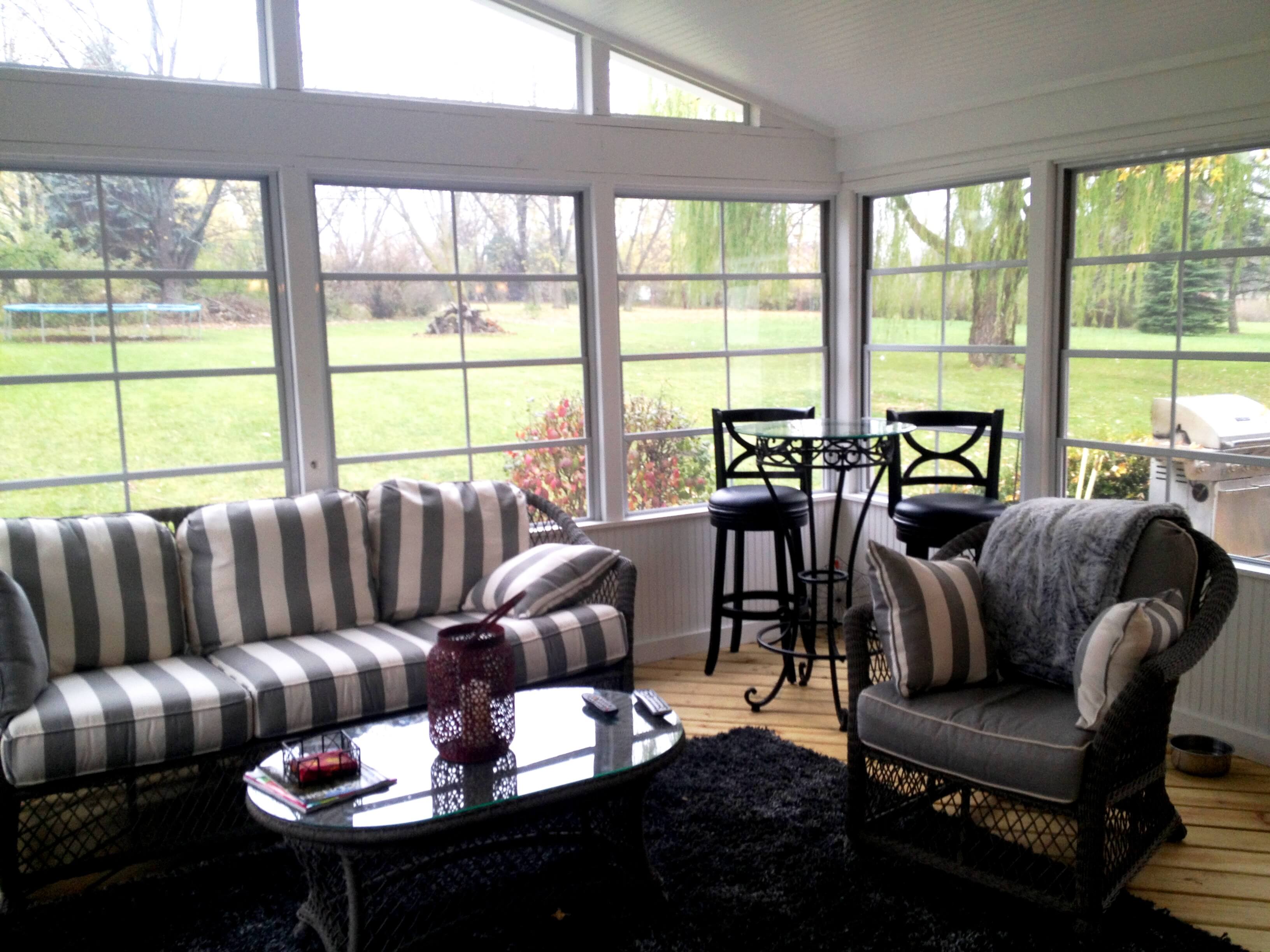 Custom screened porch with eze breeze windows sunroom