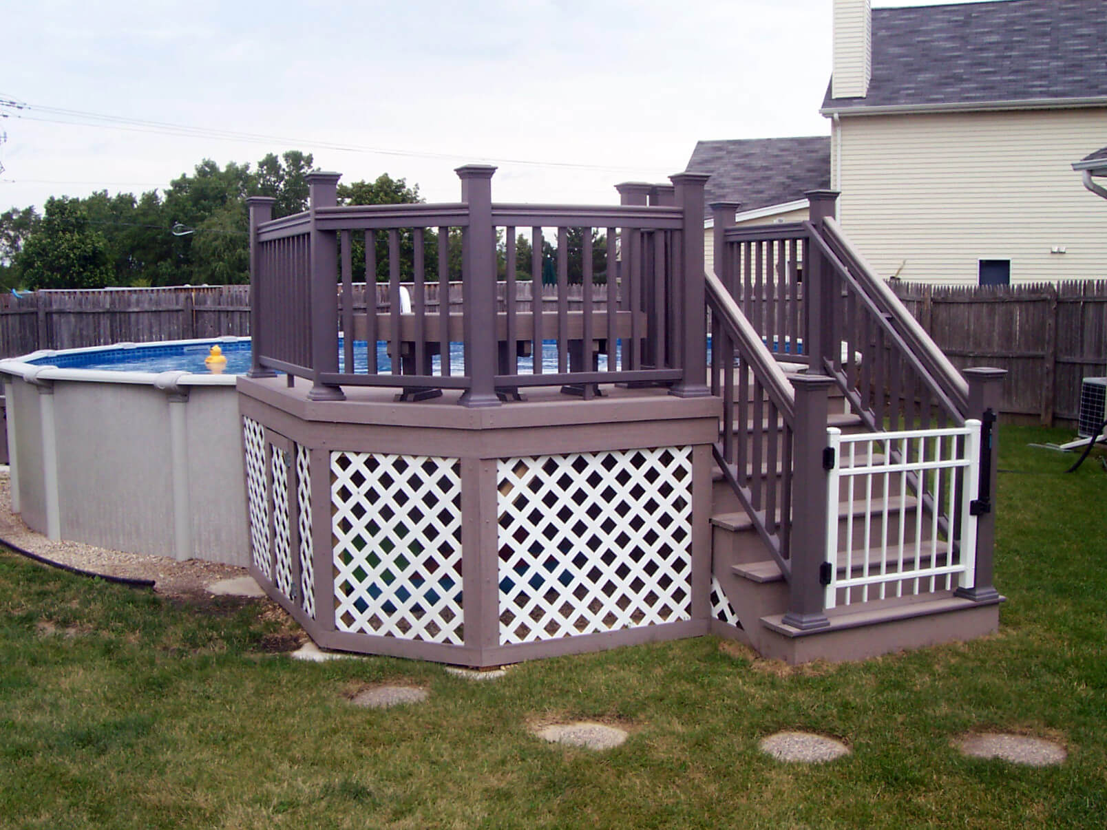 Custom small above the ground pool deck