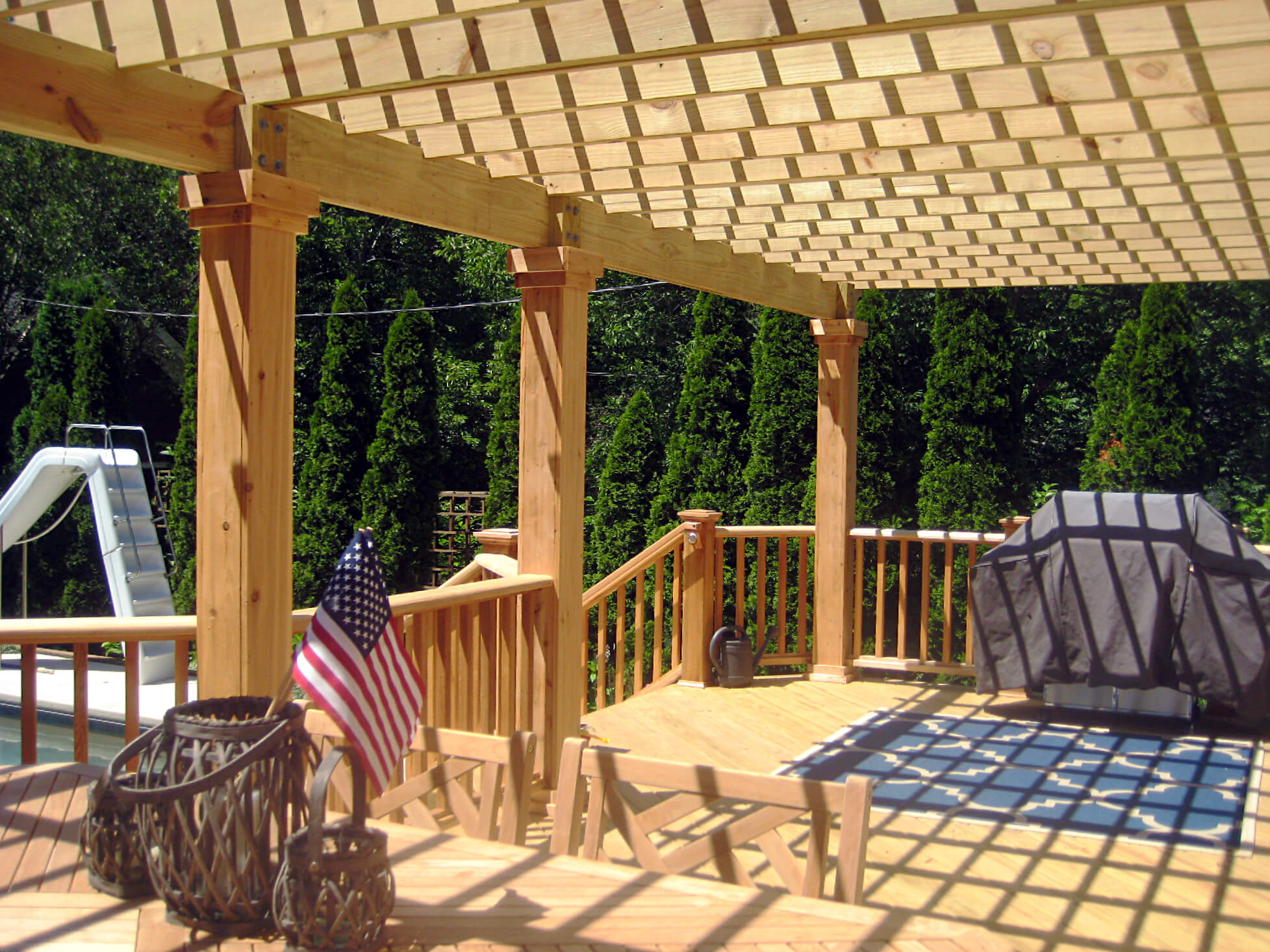 Custom wooden deck with pergola