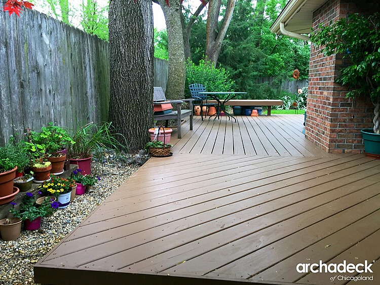 Custom deck with a table in the middle around the plants
