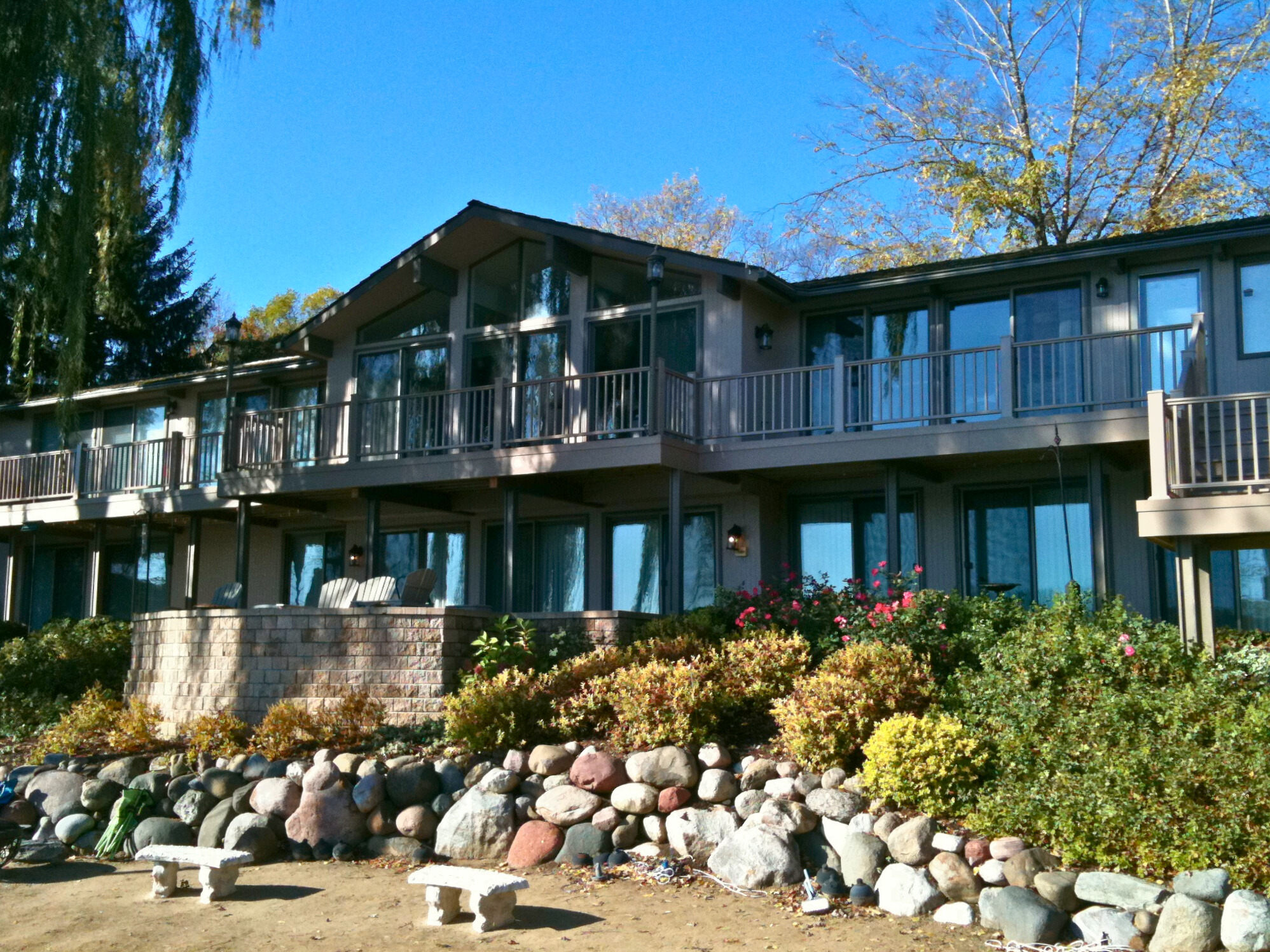 Multi-level composite deck on a lakefront home in Libertyville IL, built by a local deck builder.