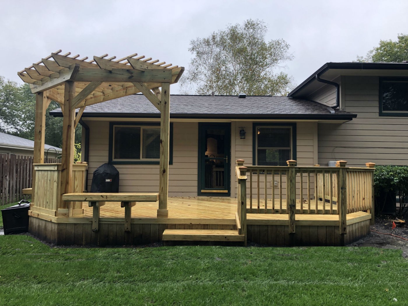 wood deck on the back of a house
