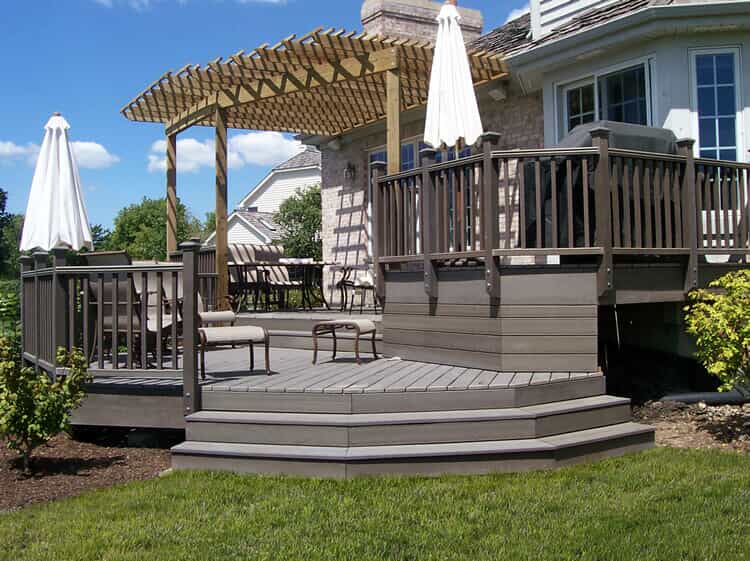 Composite deck with covering and outdoor furniture