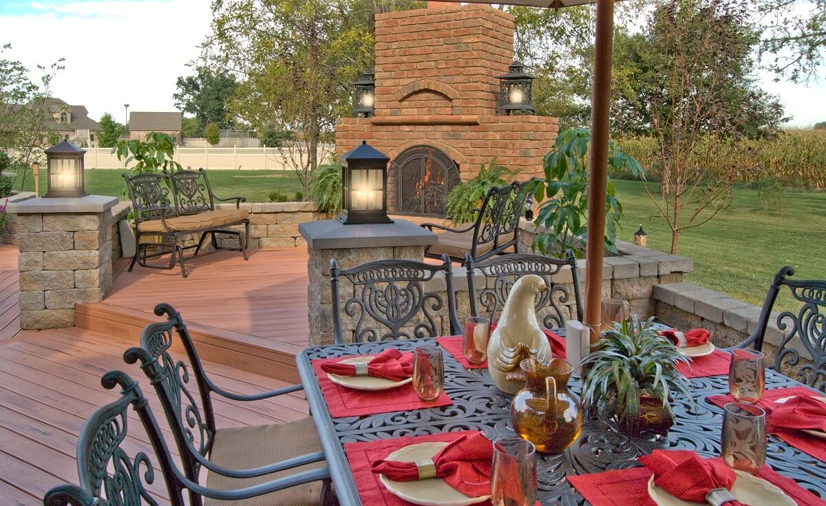 Outdoor fireplace and patio area