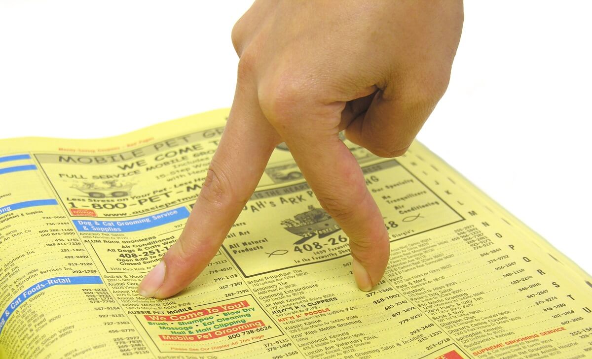 Hand on Yellow Pages