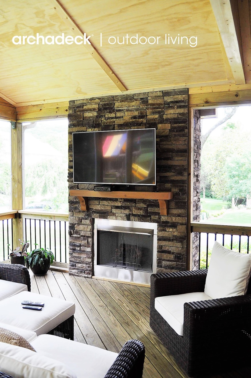 porch with custom stone fireplace