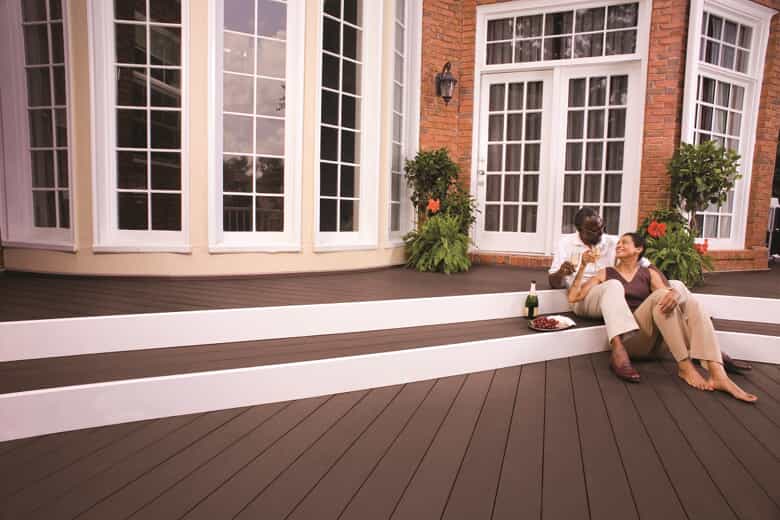 couple sitting out on custom deck