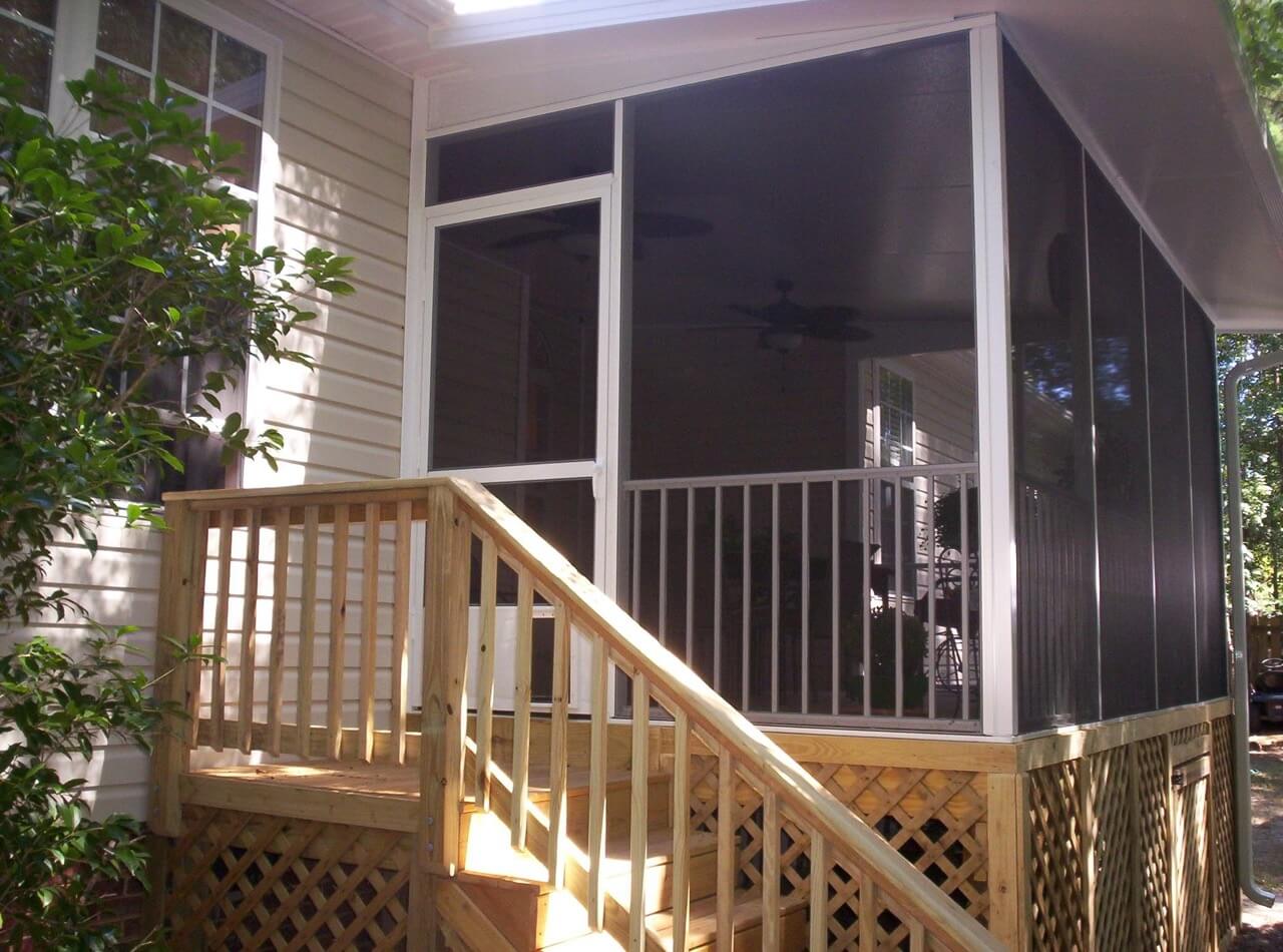 Screened porch with wood staircase