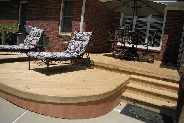 Custom low maintenance deck with lounge chairs