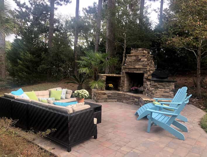 Patio with outdoor furniture and fireplace