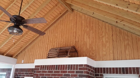 enclosed porch with roof and ceiling fan 