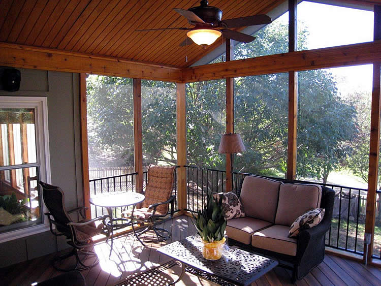 screened porch with wood floor