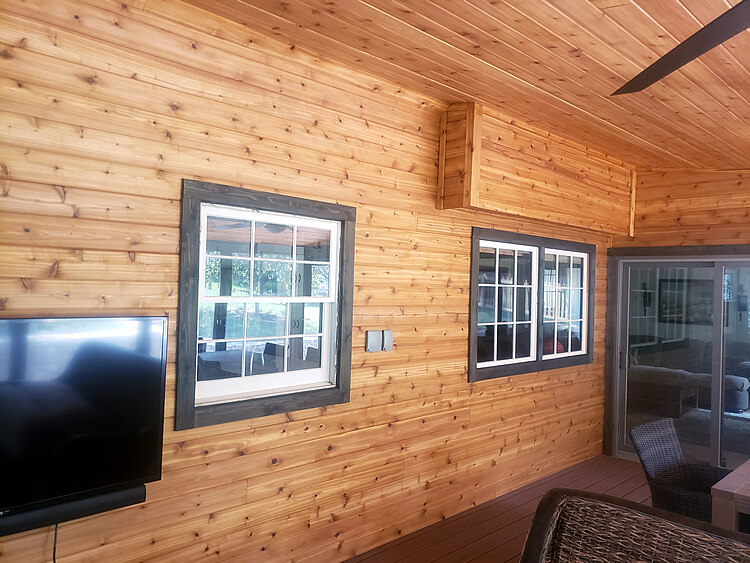 Screened porch with cedar wall