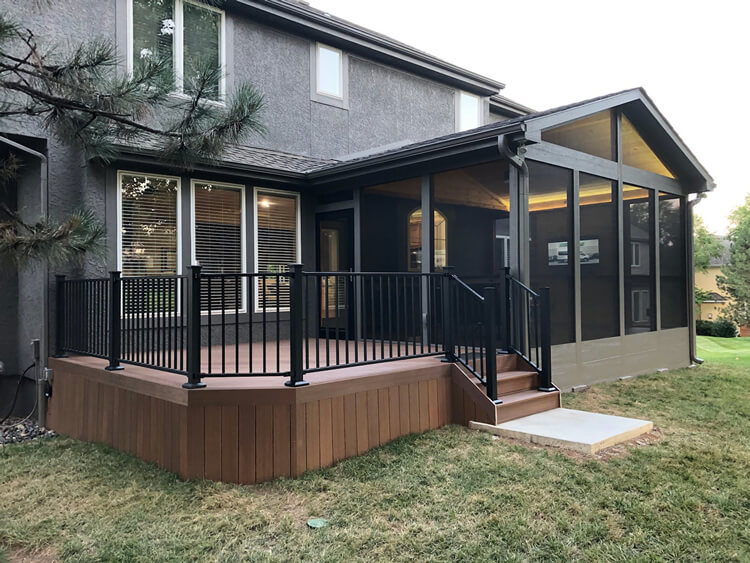 Custom backyard screened porch and deck
