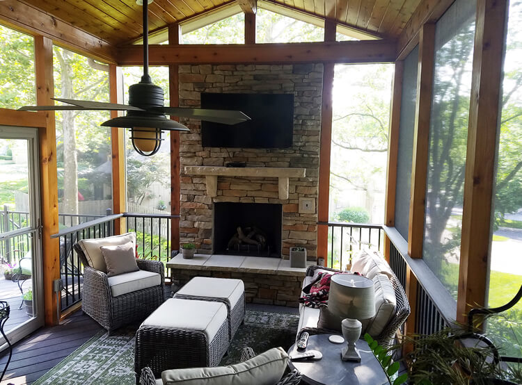 Screened porch with outdoor fireplace