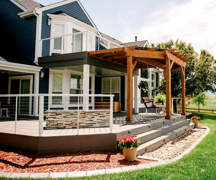 Composite deck with cedar pergola and roofs