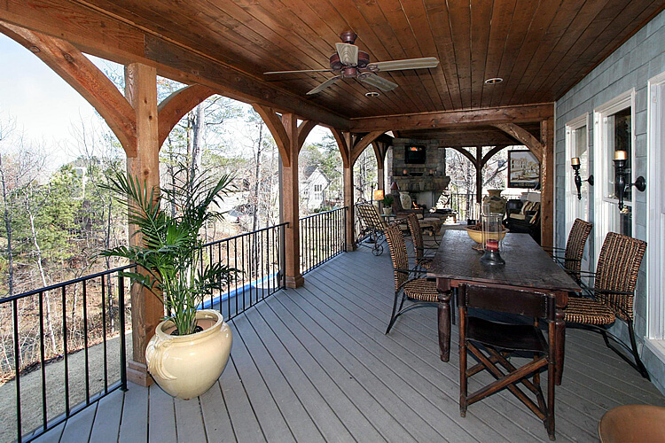 Custom deck with dining area and outdoor fireplace
