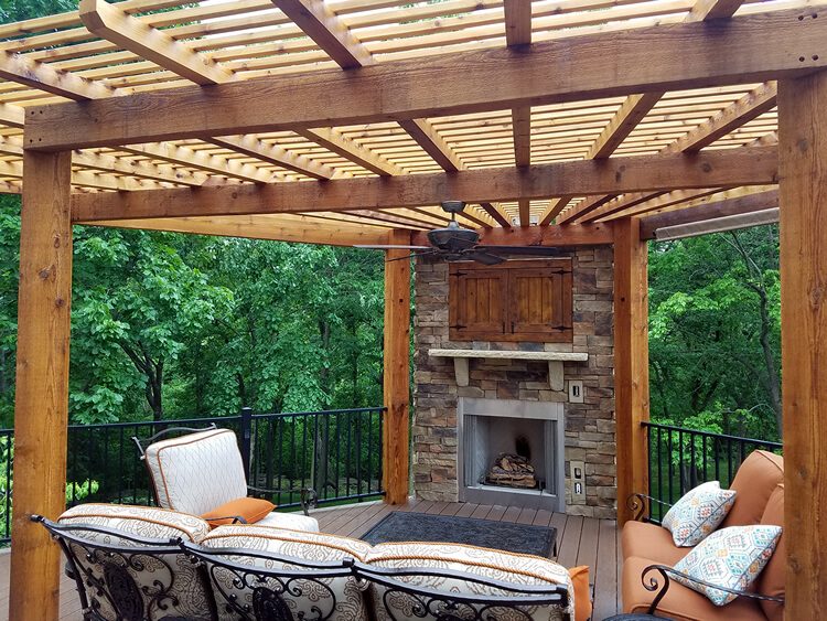 Custom deck with pergola and outdoor fireplace