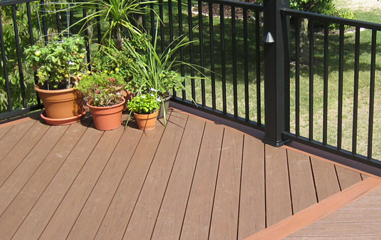 Deck floor details and potted plants by the railing
