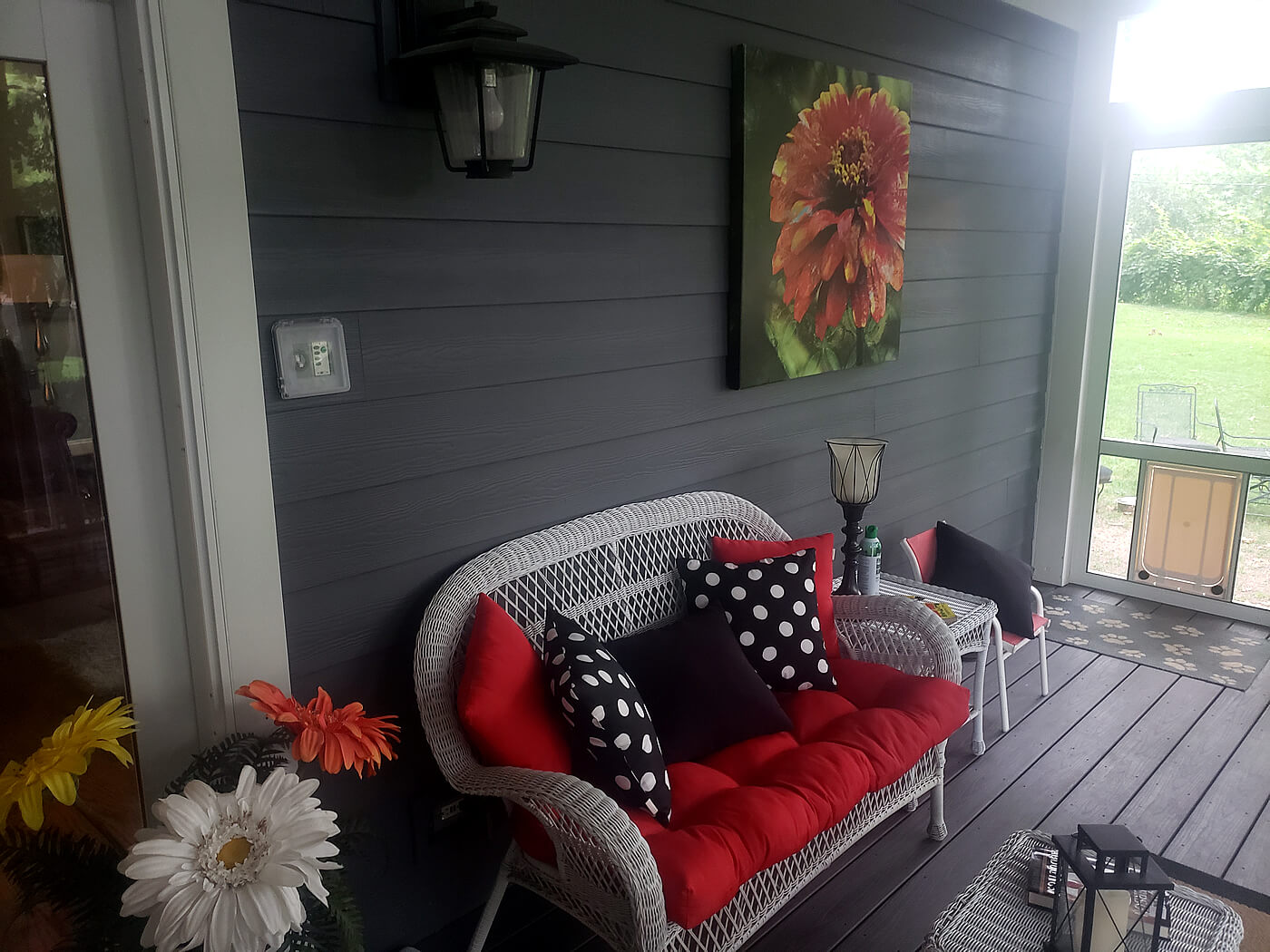 Cozy couch on screened porch